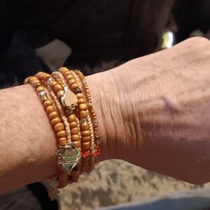 Golden Bracelets With Heart Charms